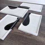 Lot of 4 rectangular glazed terracotta plates.