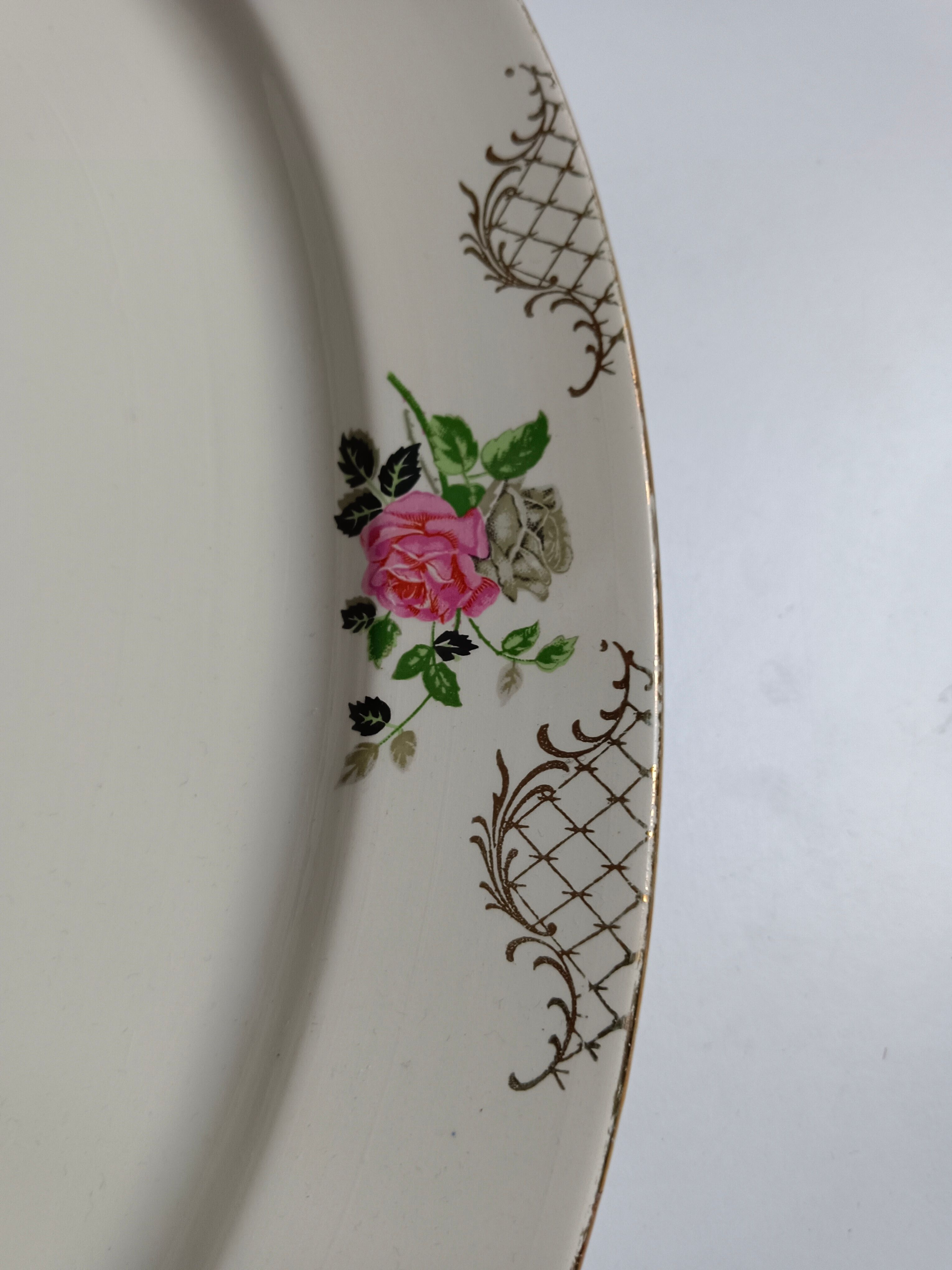 Oval plate Sarreguemines cream with pink gilding, antique.
