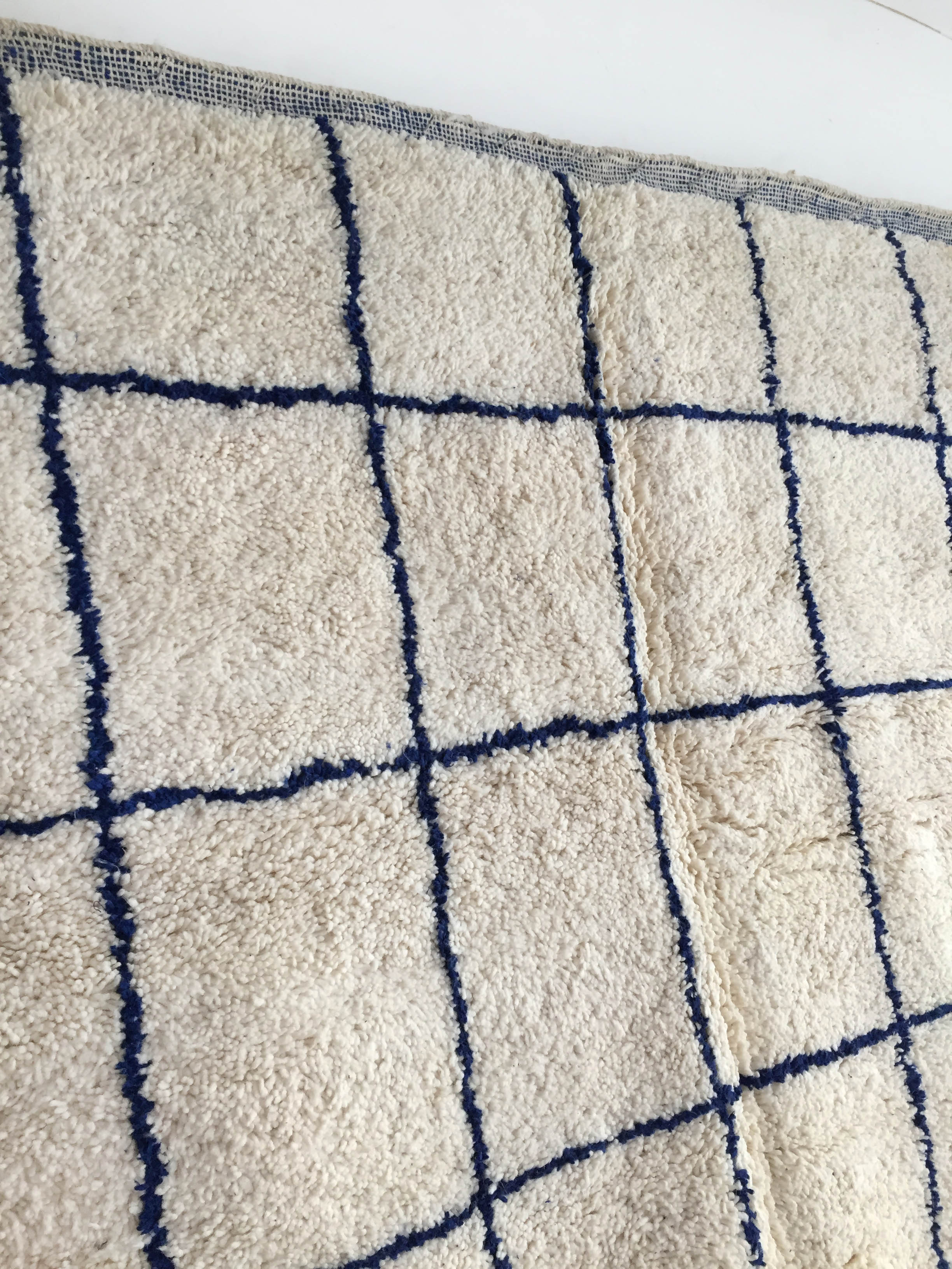 Moroccan Berber carpet Beni Ouarain ecru with largeelle blue checkered 302x190cm