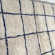 Moroccan Berber carpet Beni Ouarain ecru with largeelle blue checkered 302x190cm