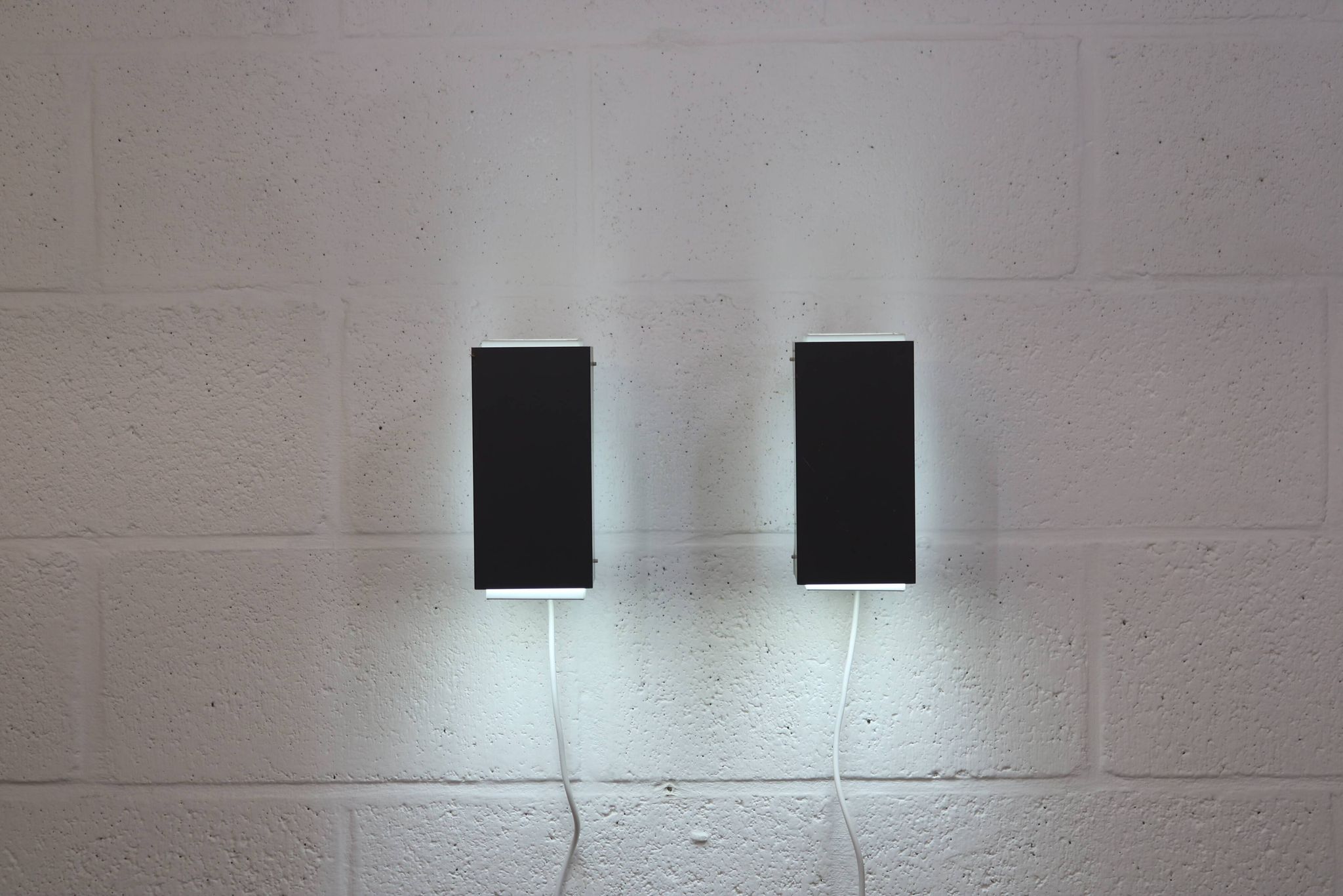 Pair of grey and white wall sconces by Preben Dahl for H. F. Belysning, 1960s