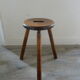 Tripod stool in raw wood with handle
