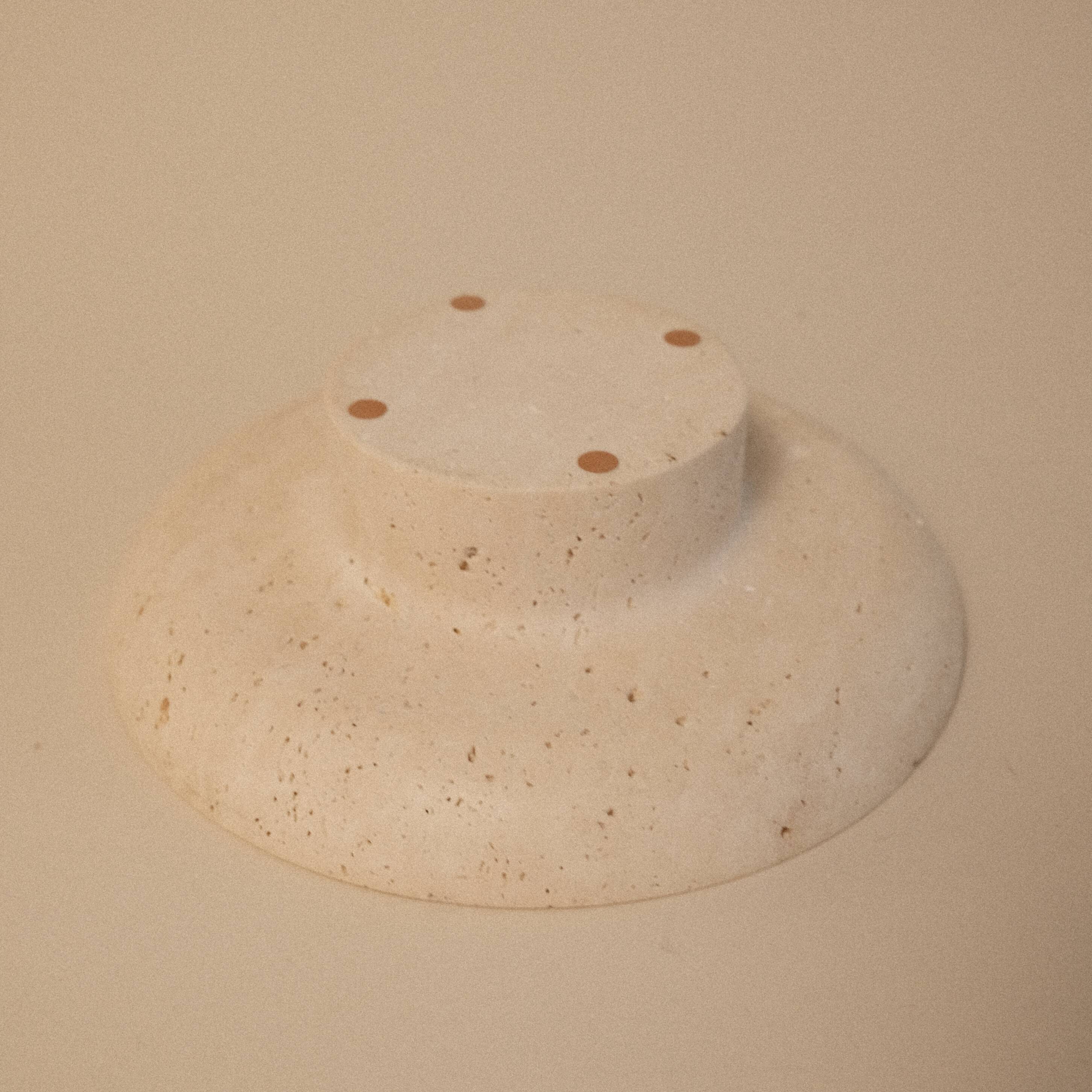 Travertine pocket emptier