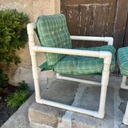 Pair of vintage tubular armchairs from the 70s and 80s, luxury design.