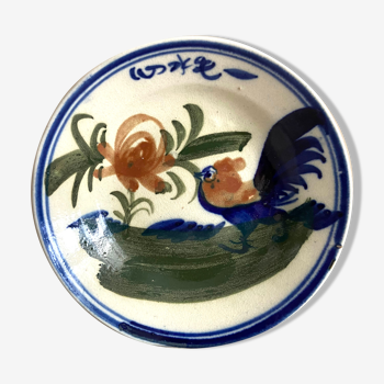 Decorative plate in painted faience