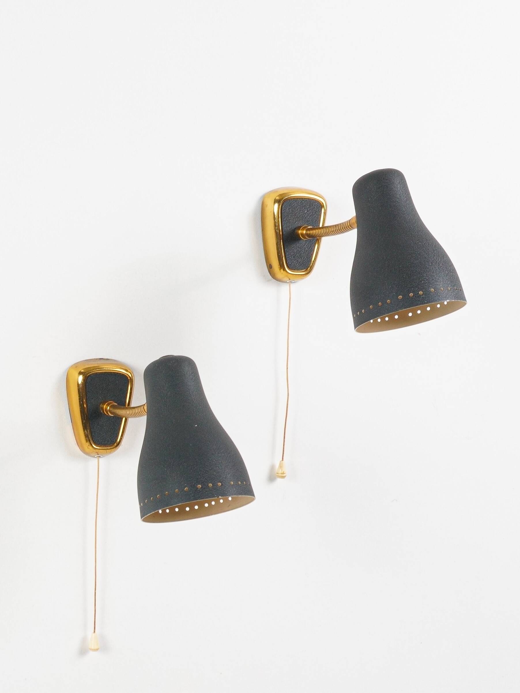 Jacques biny (designer) - pair of adjustable wall lights in brass & metal