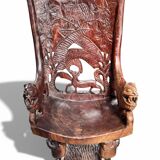 Pair of carved African armchairs