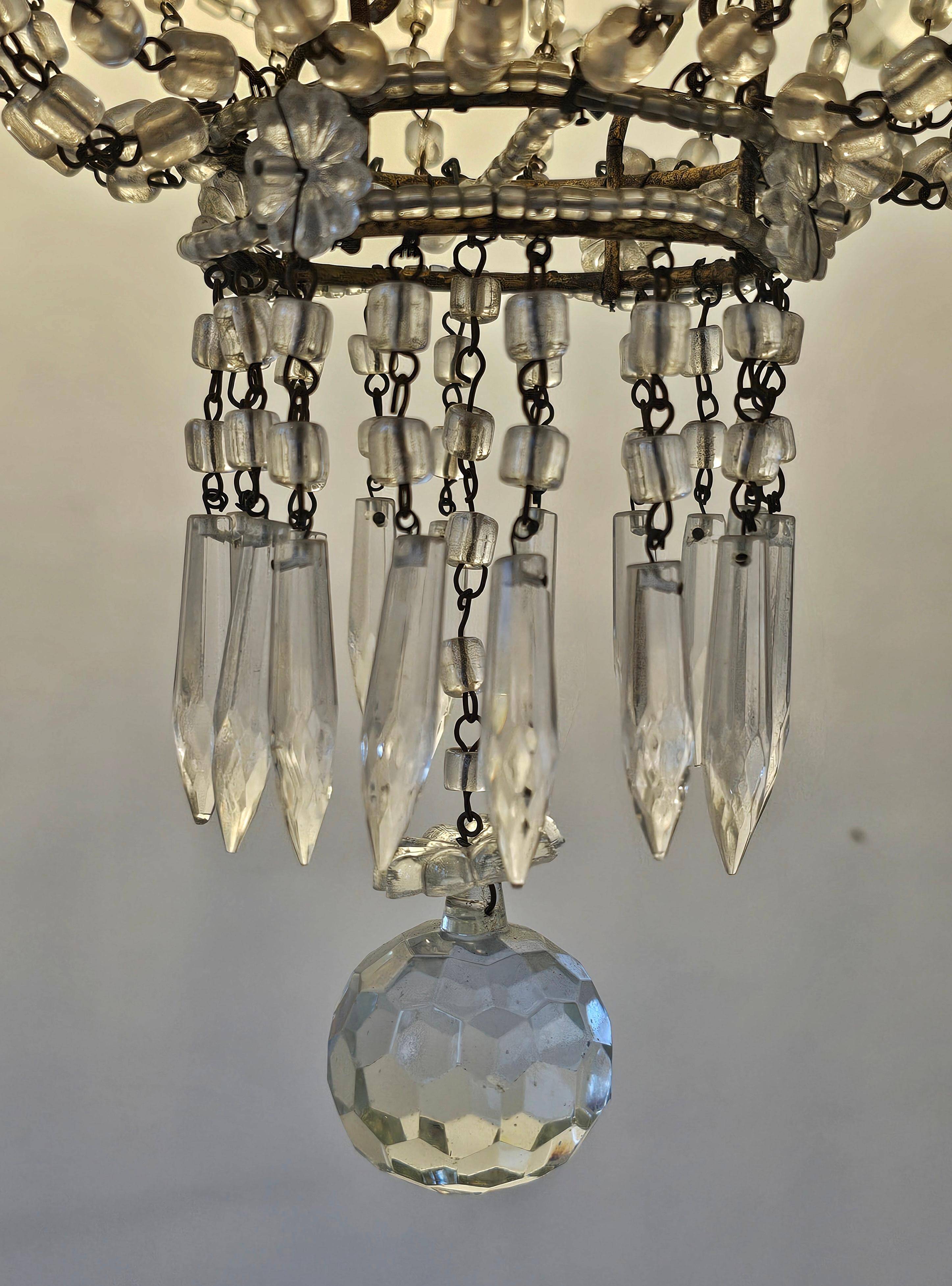 Antique crystal chandelier with floral details 1910