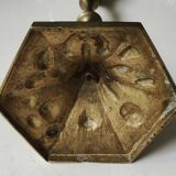 Baroque/Antique style torch candleholder, nineteenth, gilded bronze. Head motifs, volute arabesques