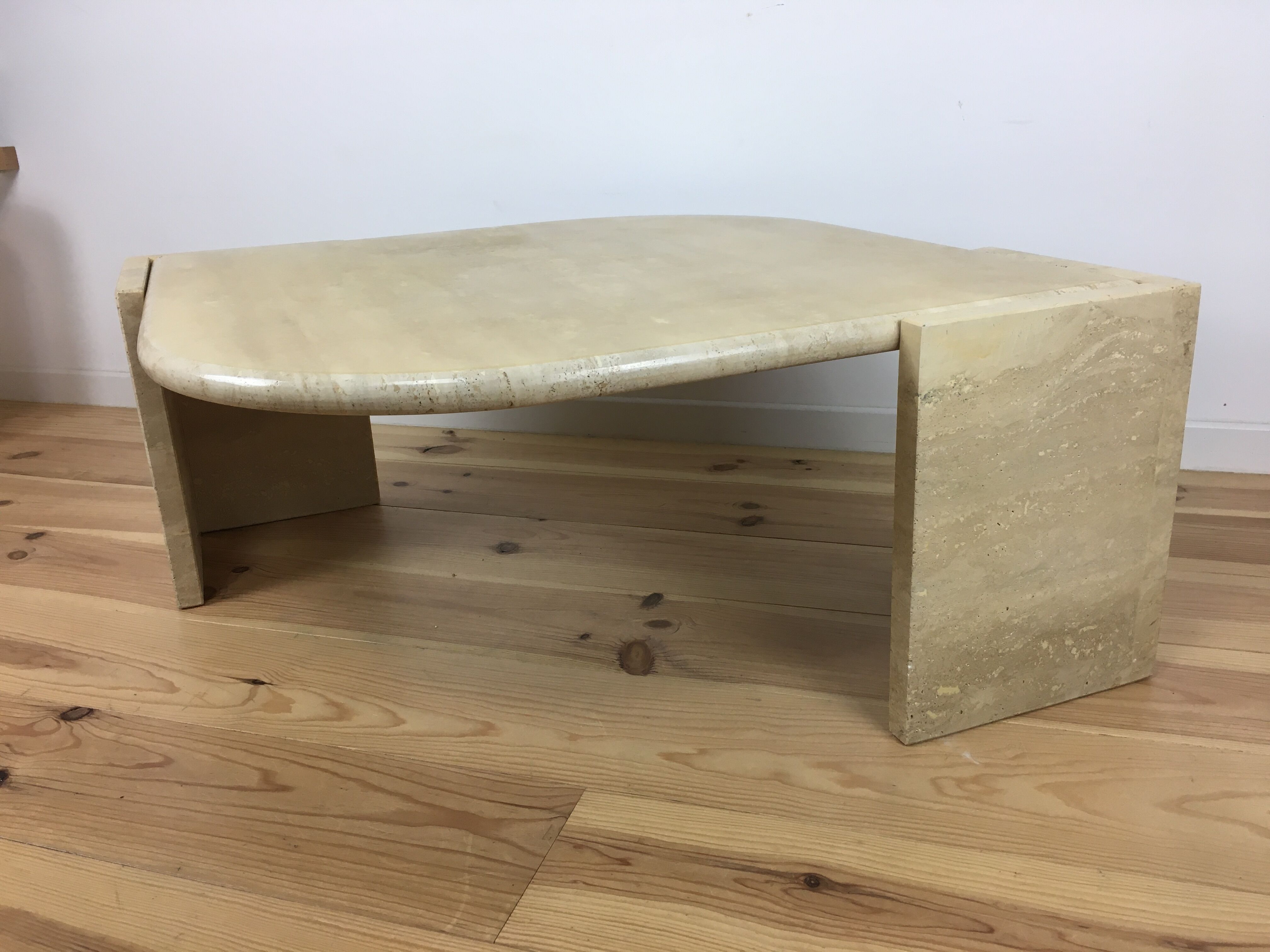 Bass table in travertine Roche Bobois