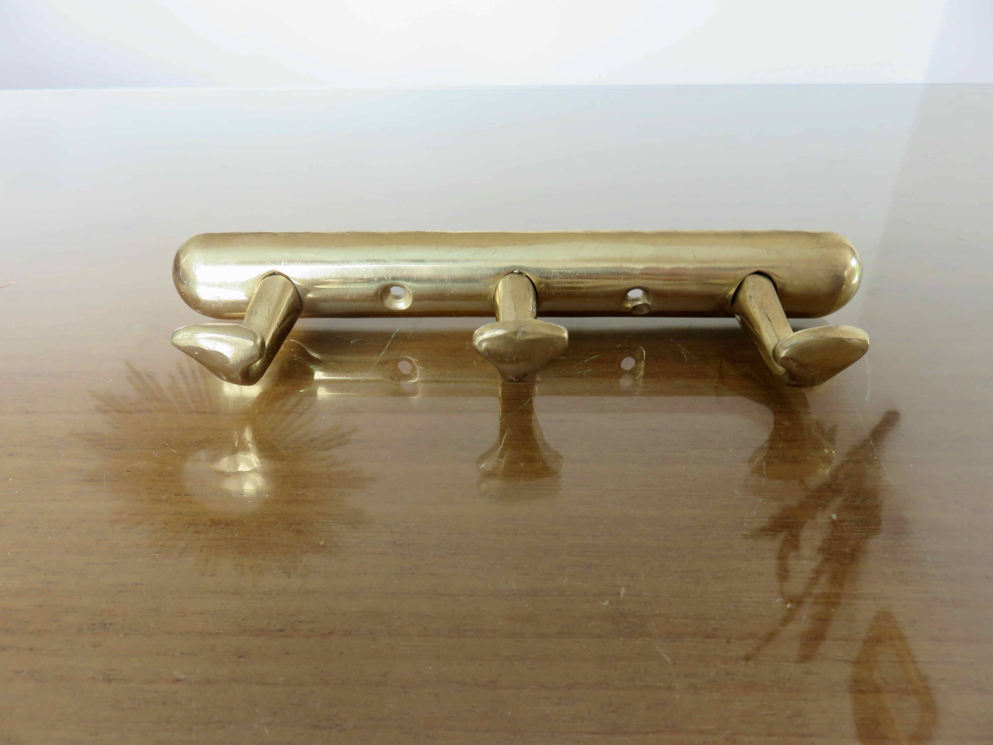 Brass tea towel holder