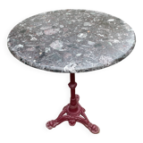 Bistro table with cast iron and marble legs
