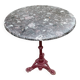 Bistro table with cast iron and marble legs
