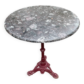 Bistro table with cast iron and marble legs