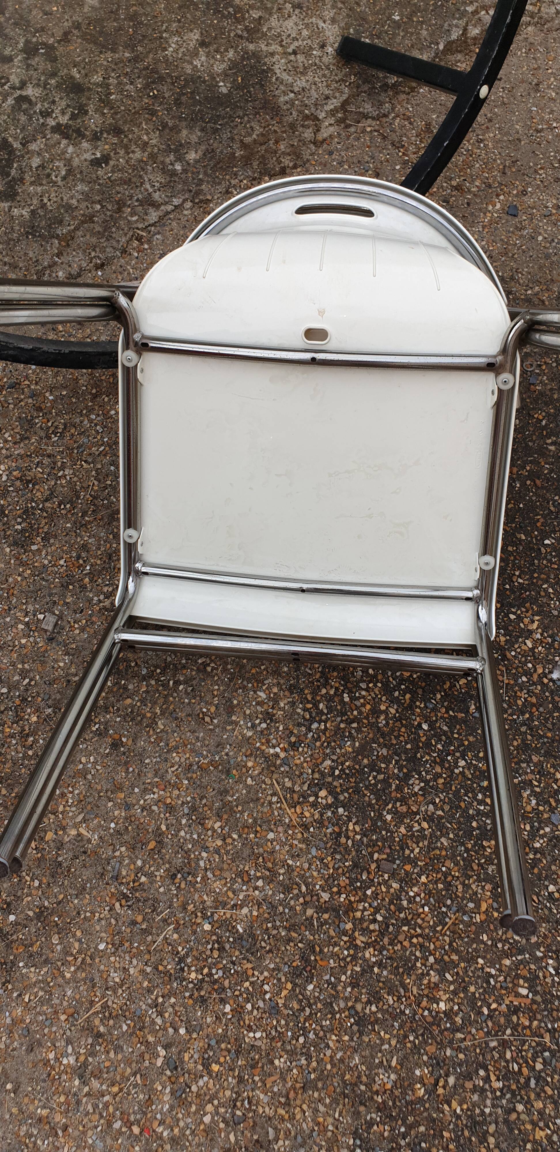 Pair of chrome and resin design armchairs