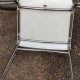 Pair of chrome and resin design armchairs