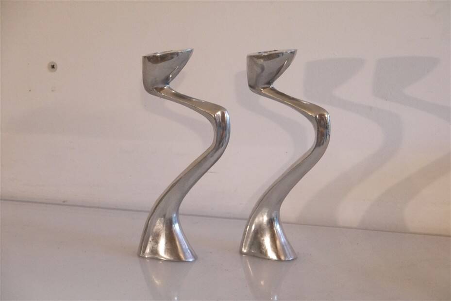 Pair of aluminium cast candle holders