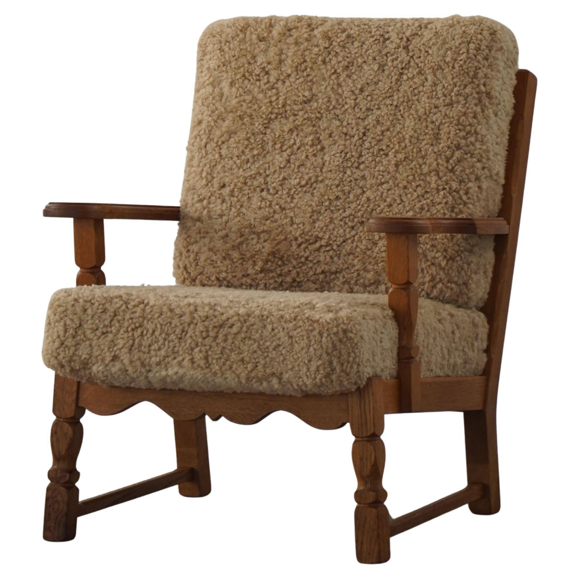 Danish modernist lounge chair in oak and lambswool, Henning Kjærnulf, 1960s