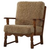 Danish modernist lounge chair in oak and lambswool, Henning Kjærnulf, 1960s