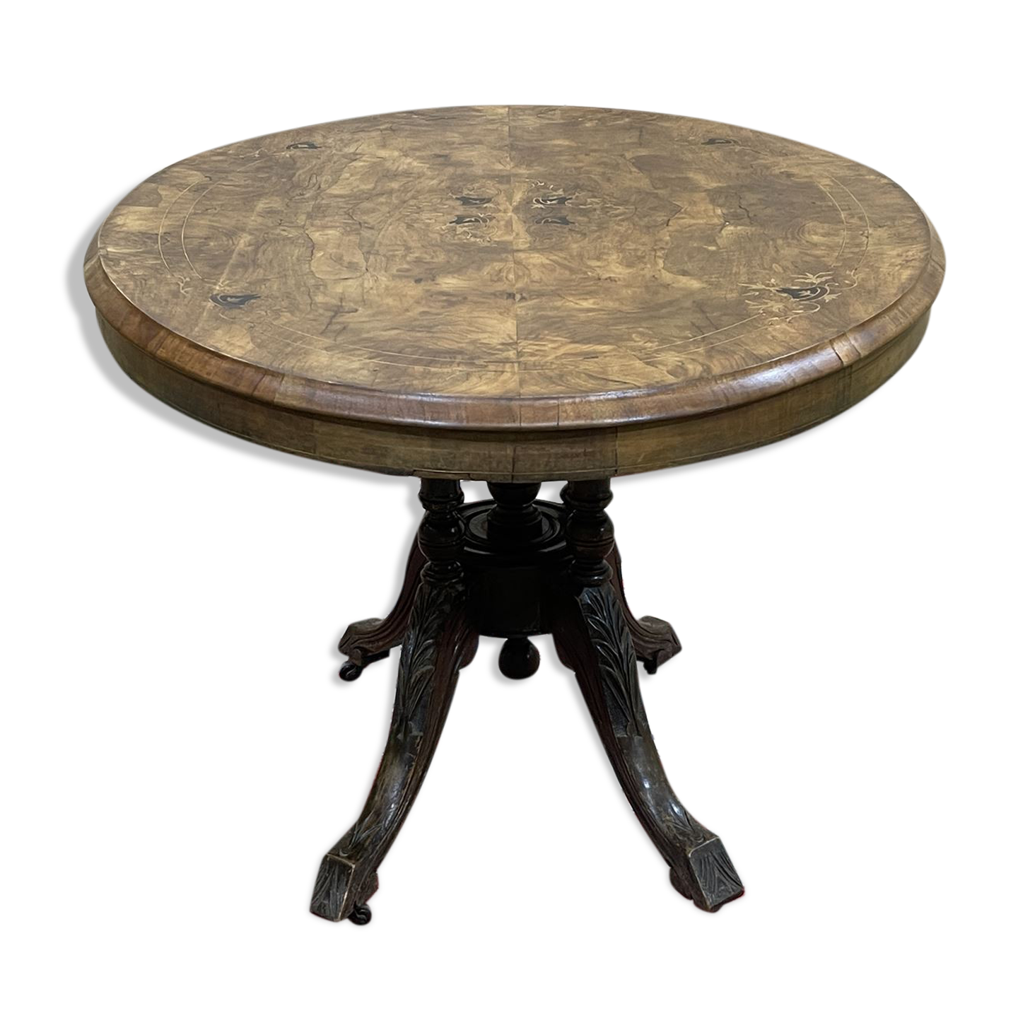 English guéridon from the late 19th century in walnut, ebony, and boxwood veneer.