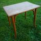 Small wooden coffee table, circa 1910