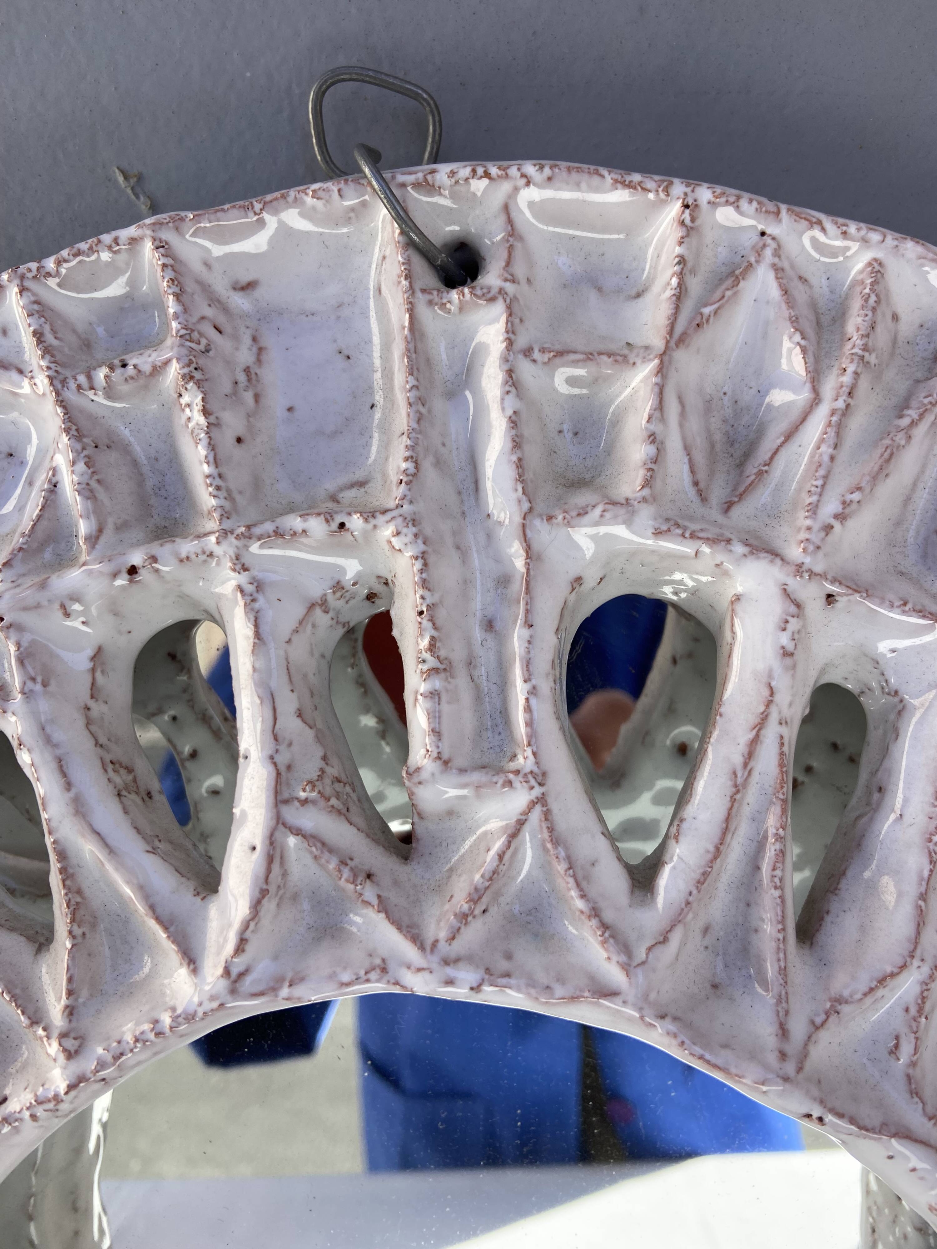 Ceramic mirror by Roland Zobel