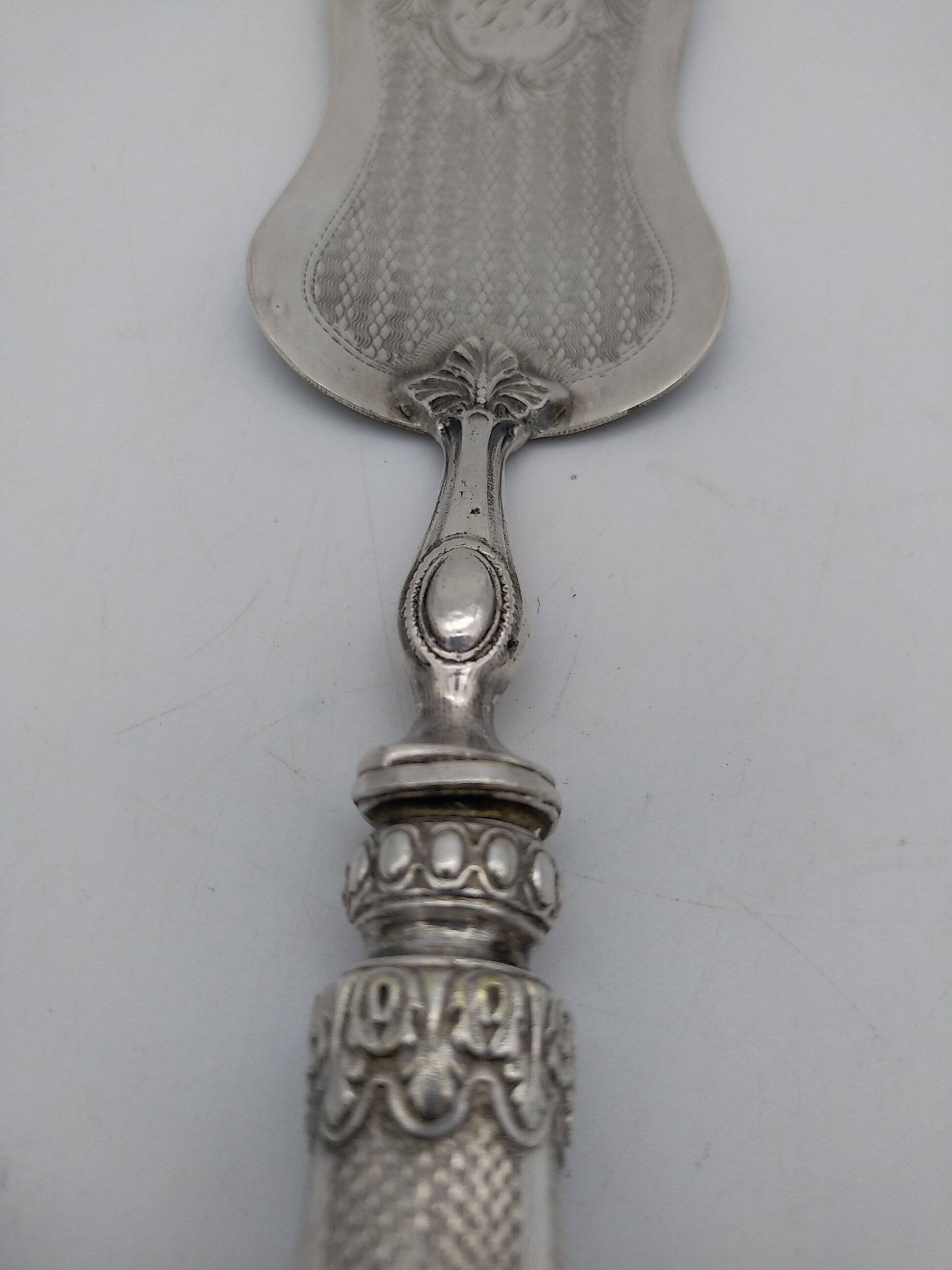 Silver and silver-filled pie server. 19th century.
