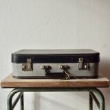 Old cardboard suitcase with its two keys