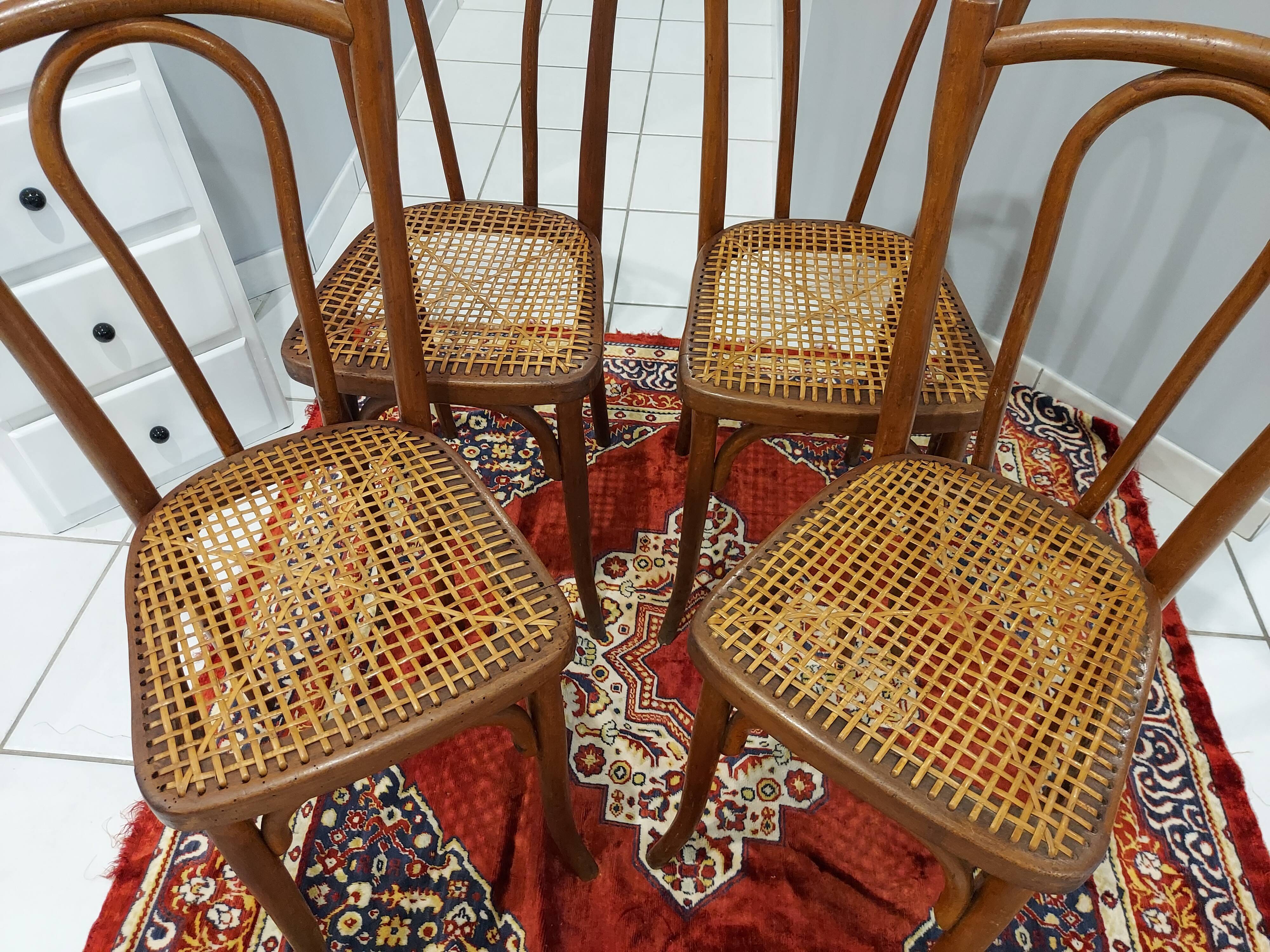 Suite of 4 chairs of Bistrot cannage Japy Frères 1920s