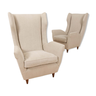 Pair of Italian wingback lounge chairs reupholstered