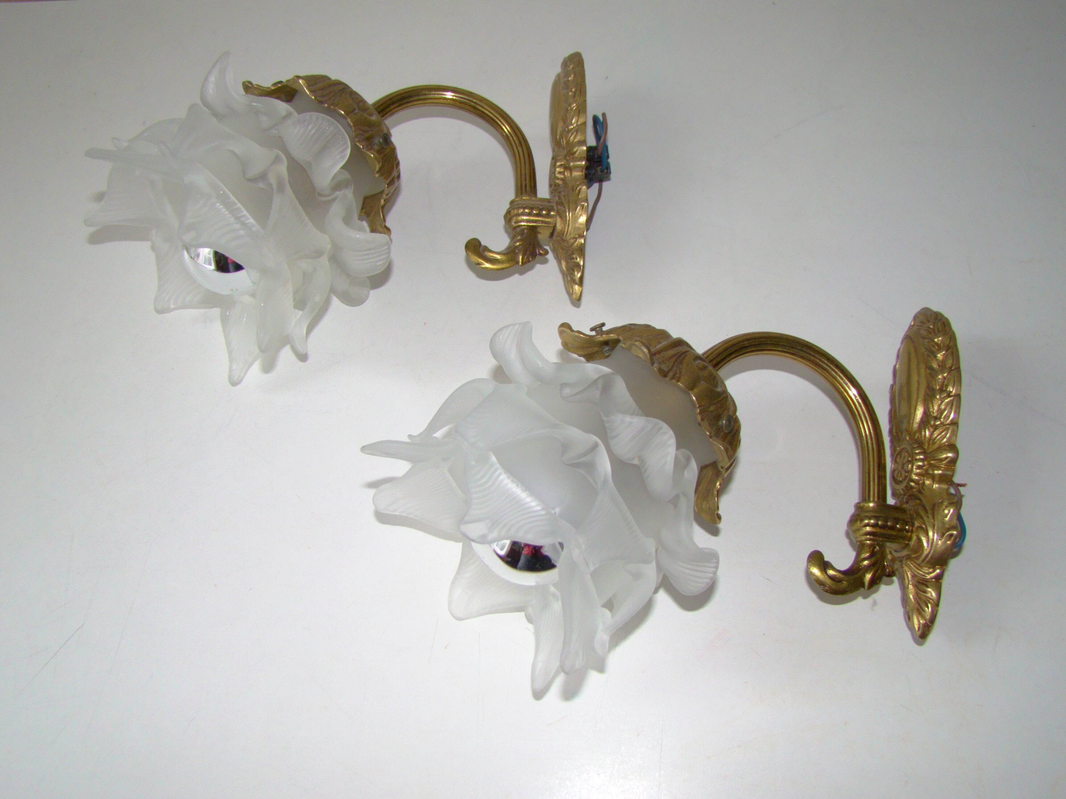 Pair of tanned sconces and glass paste