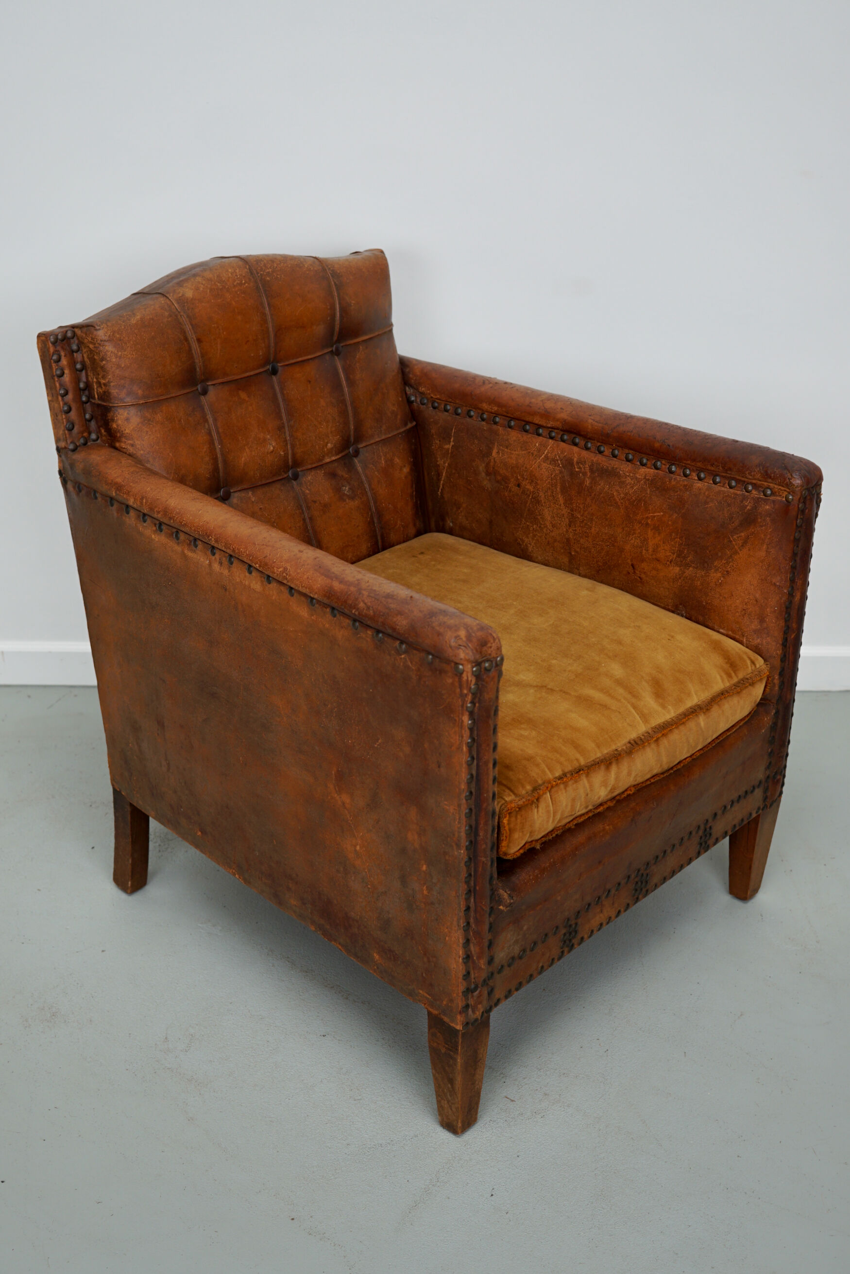 French cognac leather buttoned back club chair