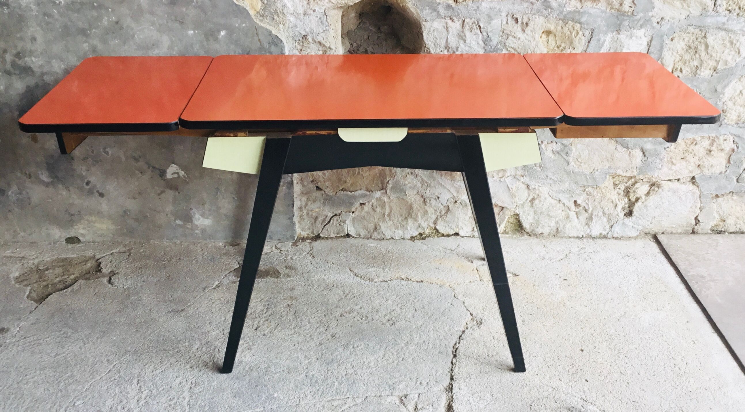 Vintage table with extension cords and orange-red formica drawers feet compass - 1960