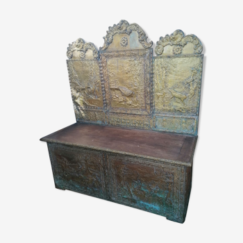 Repelled brass chest bench