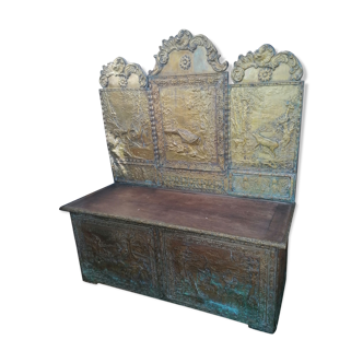 Repelled brass chest bench