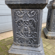 Large antique cast iron vases on pedestal