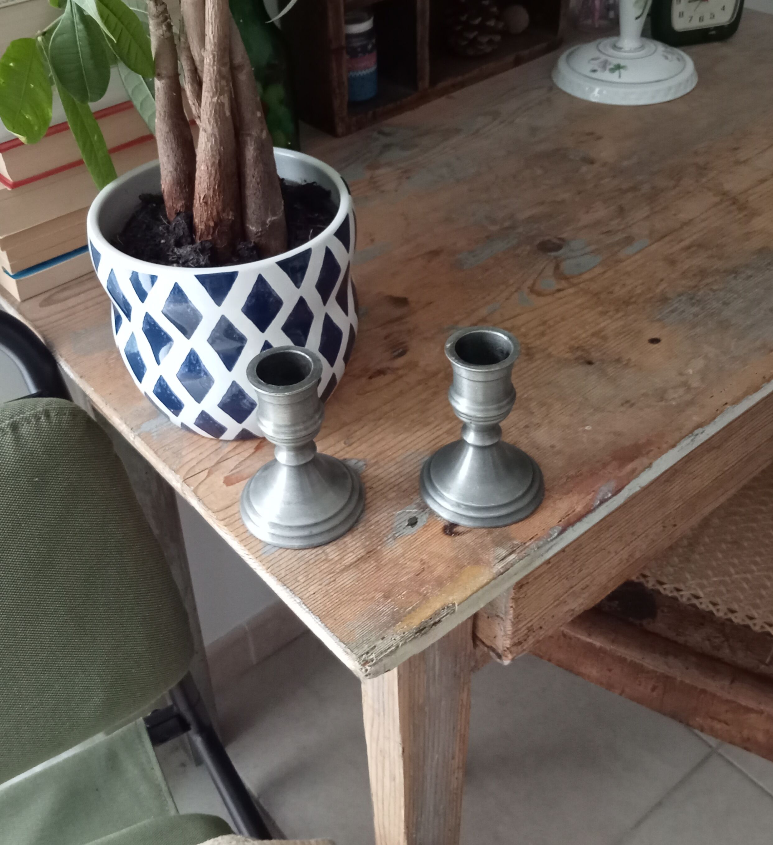Pair of antique pewter candle holders
