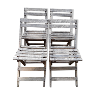 Following four folding garden chairs