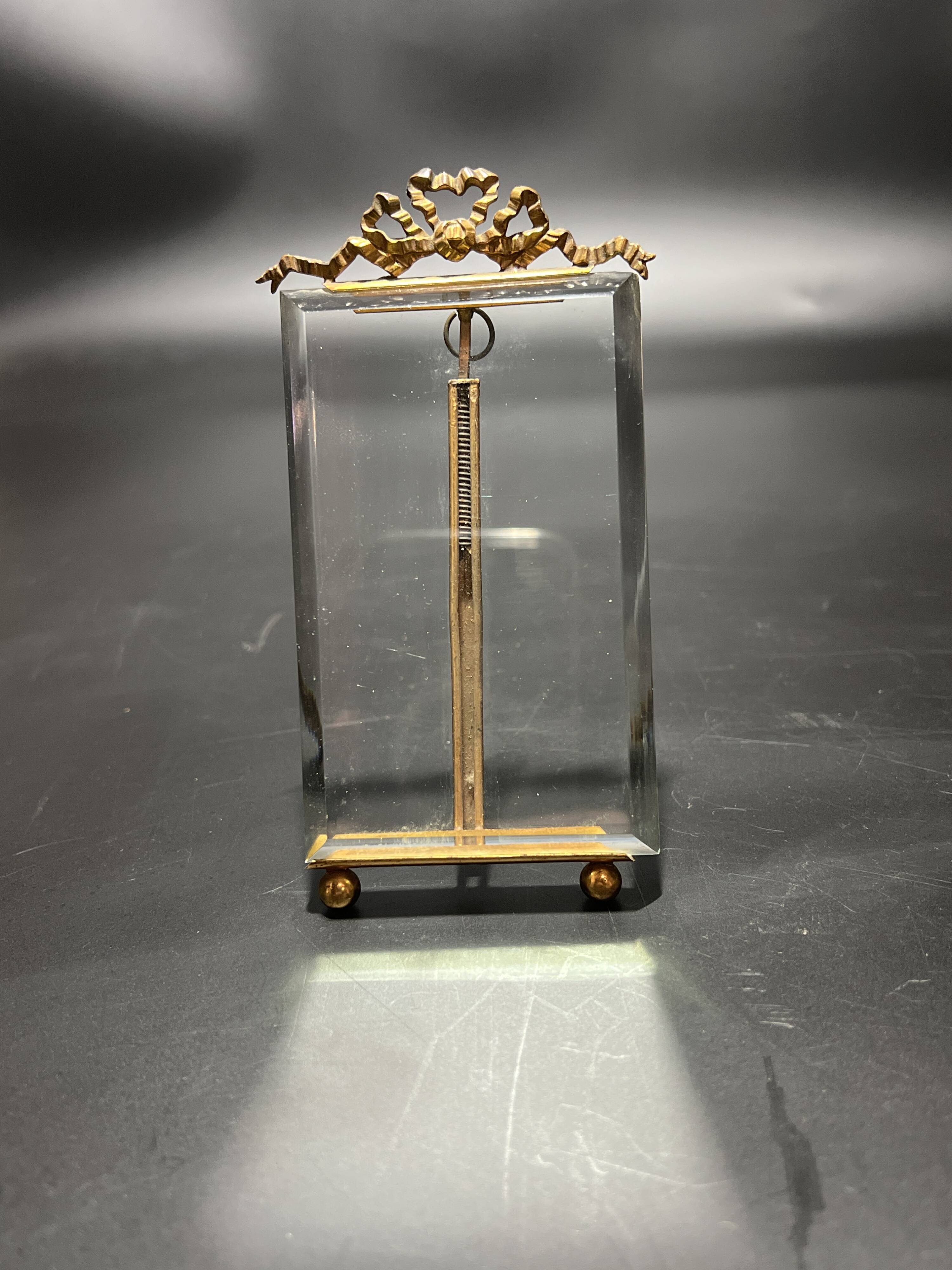 Glass and metal frame