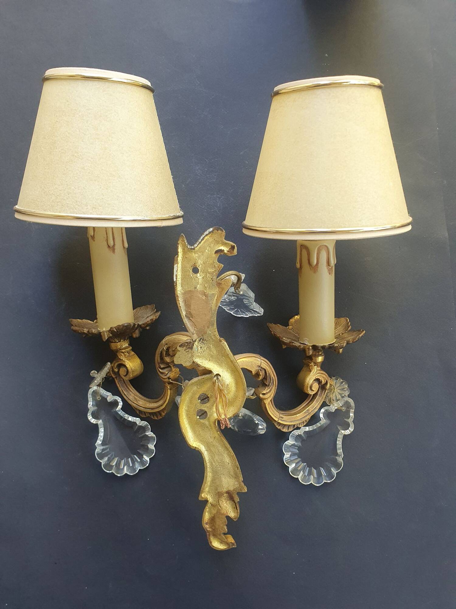 Pair of wall sconces candle holders with antique pendants
