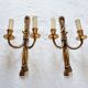 Pair of French wall sconces in bronze, Louis XVI style, with cord.