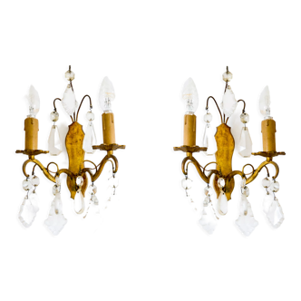 Pair of golden sconces with tassels