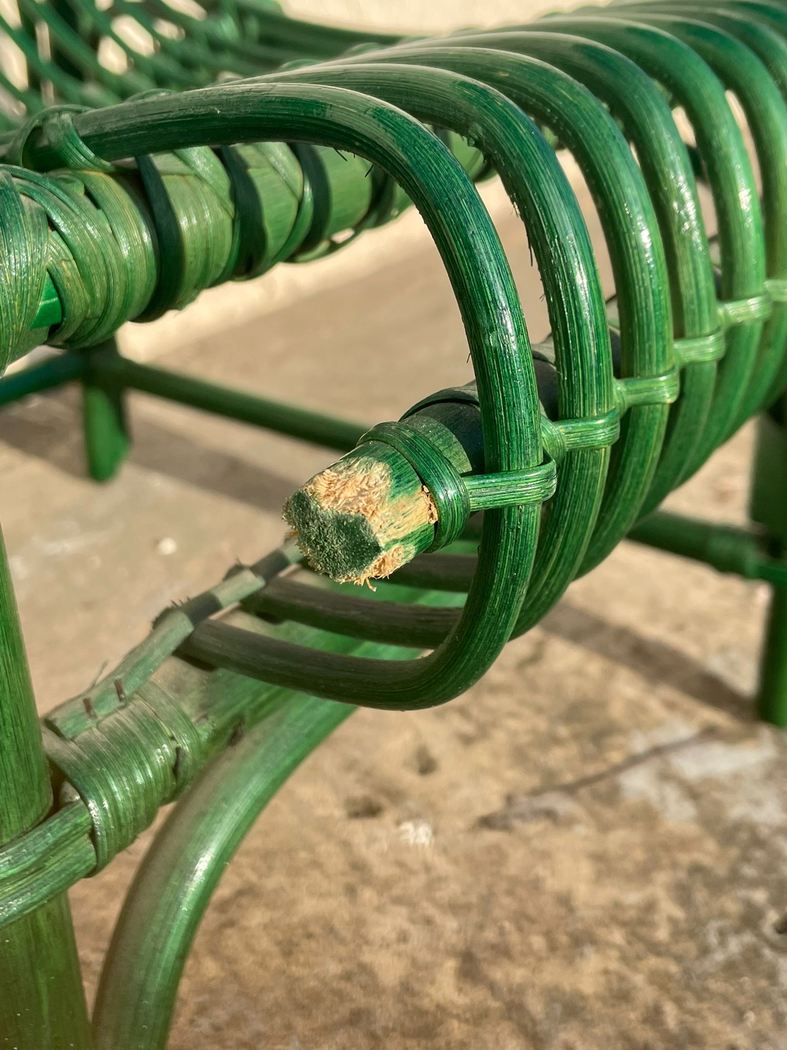 Green rattan armchair
