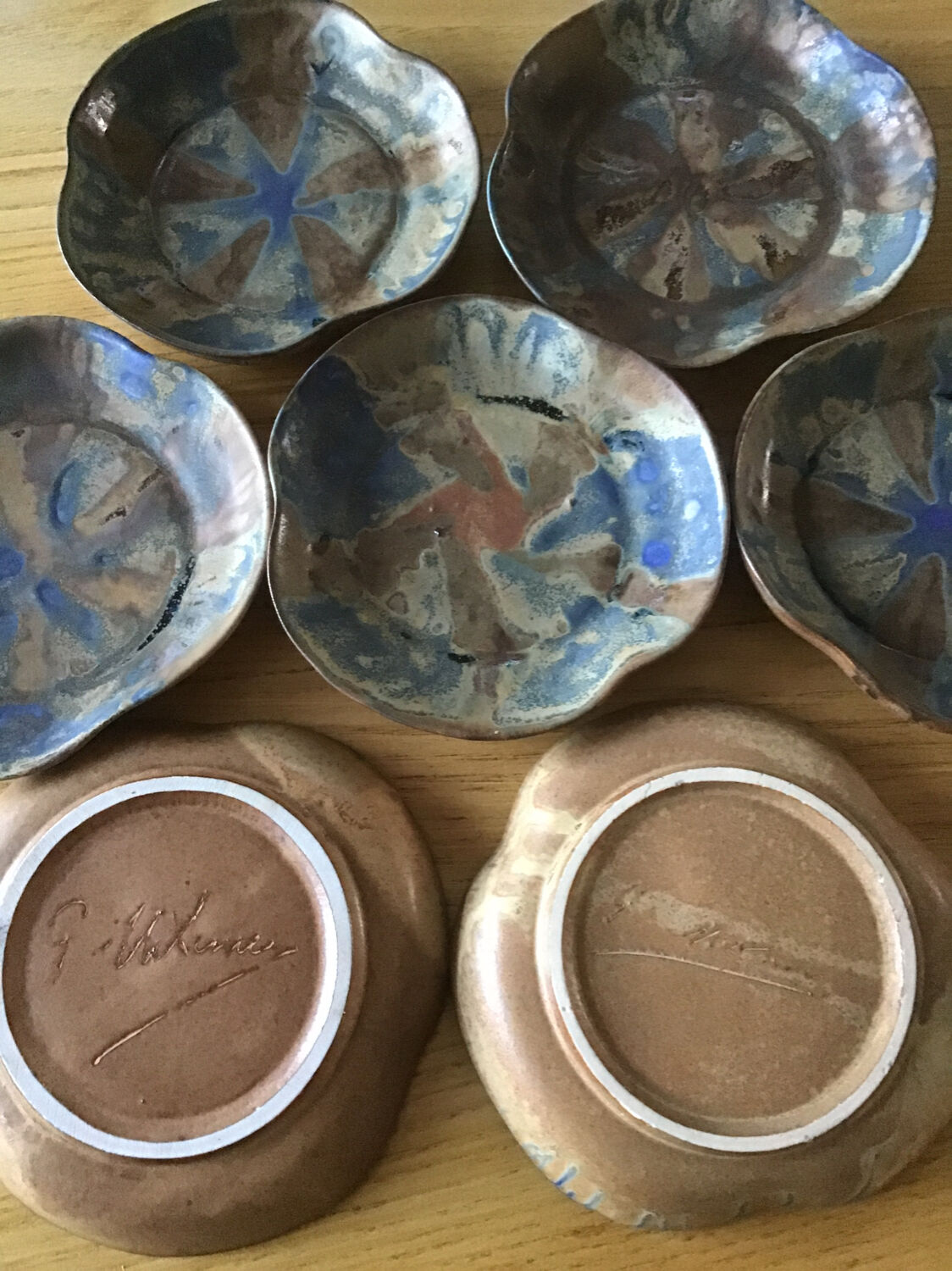 7 stoneware cups signed G Méténier