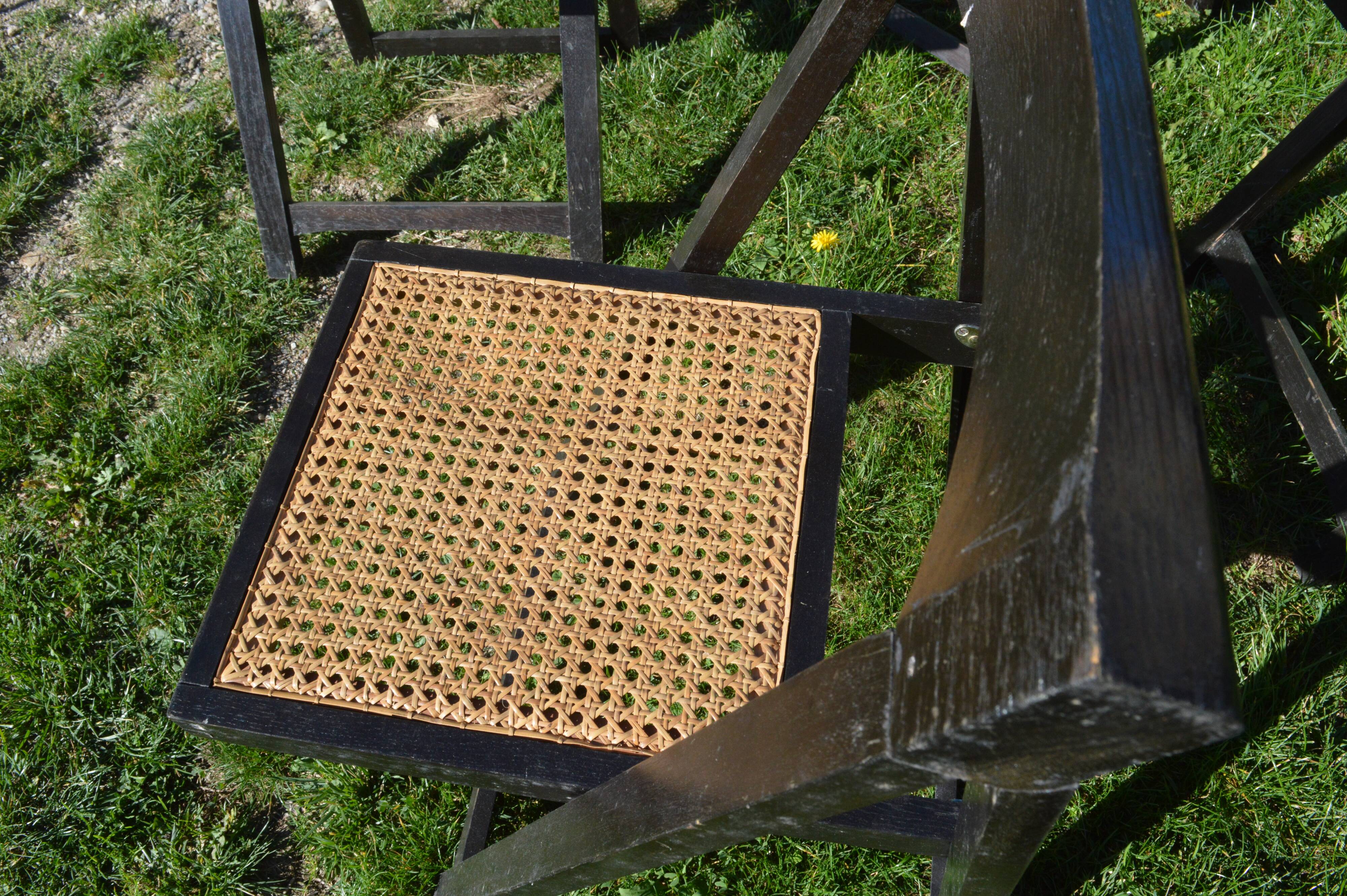 Suite of four folding chairs