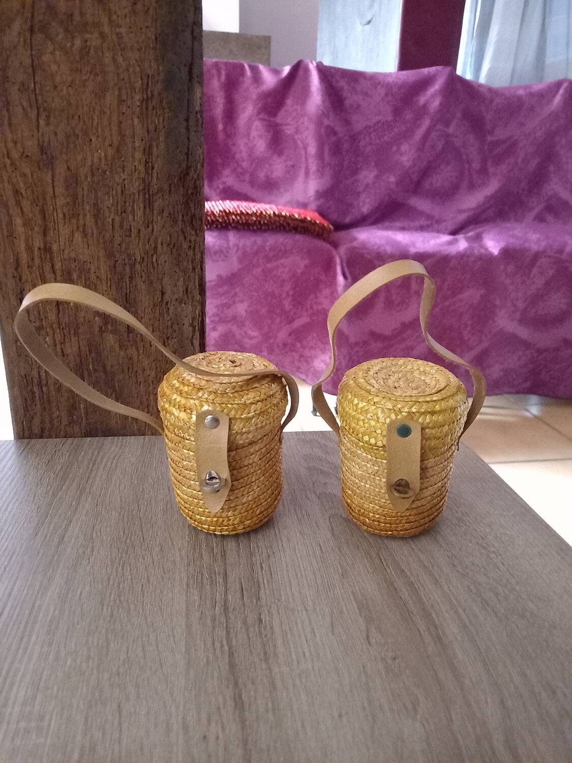 2 small rattan and leather baskets
