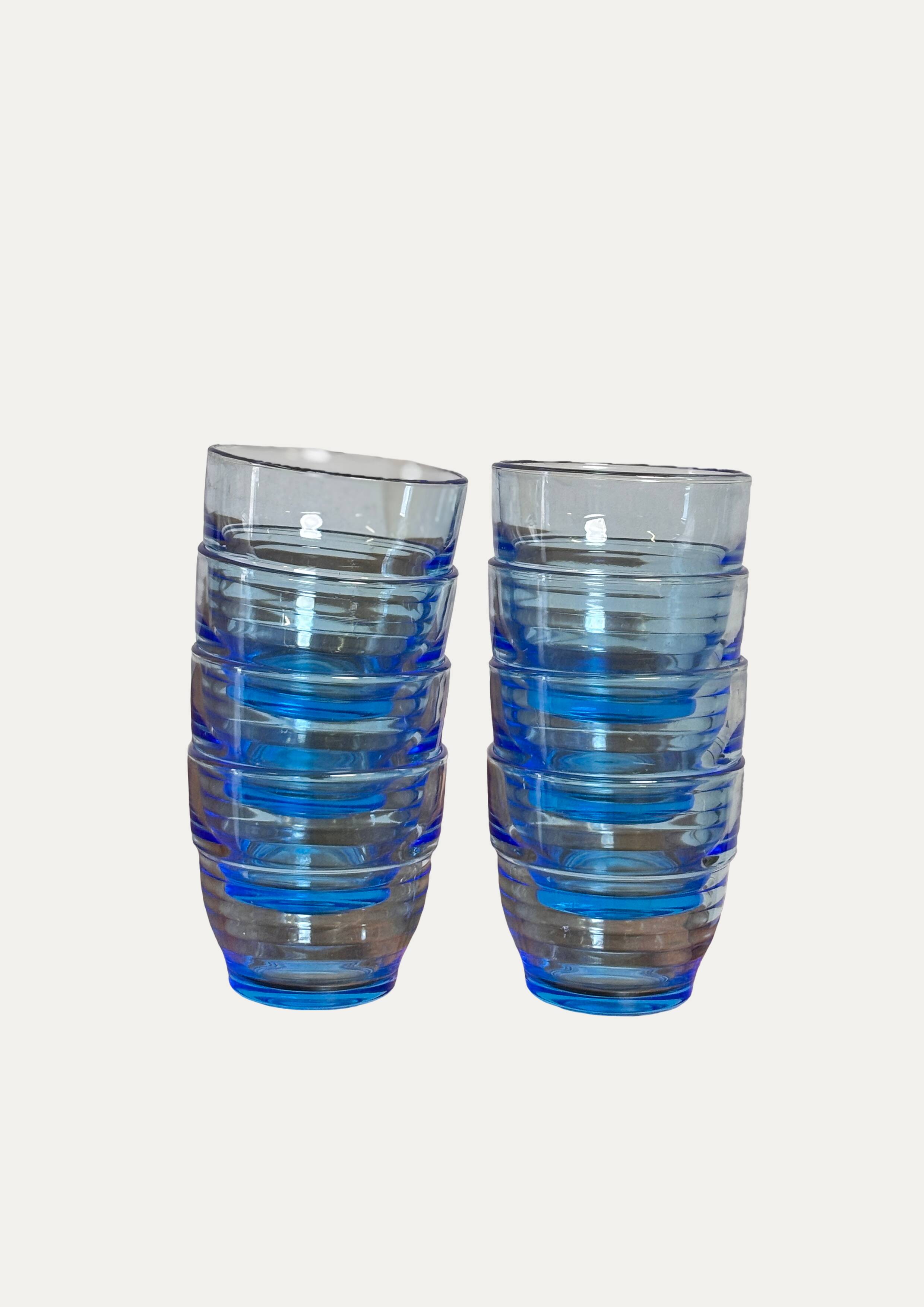 Set of 8 blue Arco France glasses.