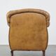 Fauteuil ancien en cuir de mouton