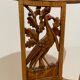 19th century straw chair with carved peacock back