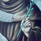 Old religious light frame in gilded stucco and curved glass